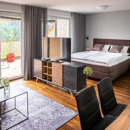 Apartamento Der Sonnberg Alpinlodges - Mit Seeblick, Privater Sauna Und Self Check-in *
